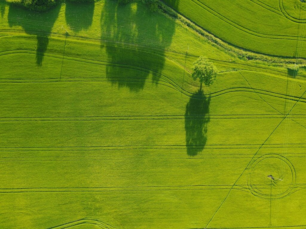 Illustrative aerial farmland landscape by Aerial Nomad / Unsplash; not a legal survey or parcel boundary map.