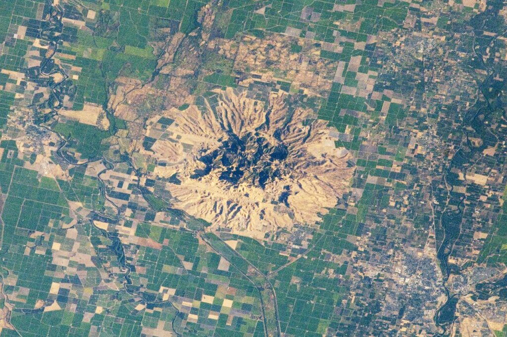 Aerial photograph of the Sutter Buttes, July 2012. Photo: Expedition 32 crew / NASA; Public domain (NASA).
