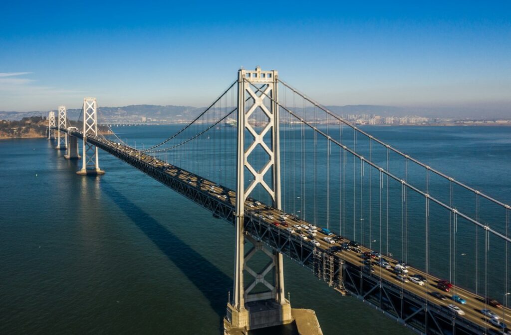 Illustrative bridge landscape, photograph by Tyler Casey / Unsplash. Not the reported California event or project location.