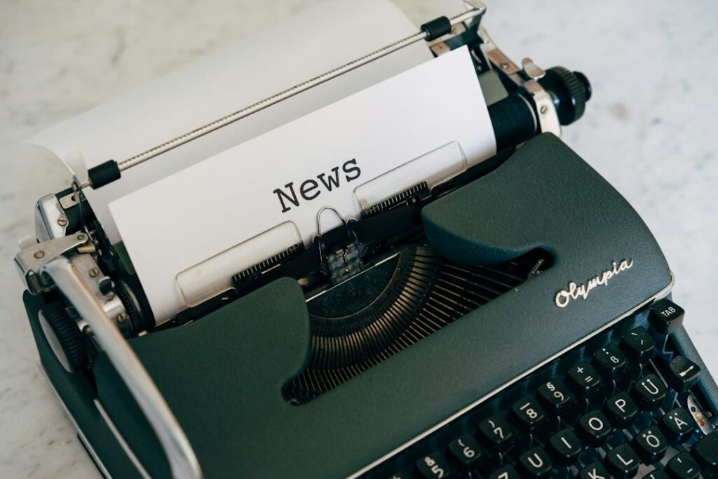 News media and journalism concept illustrating American Community Media's 2026 Impact Report