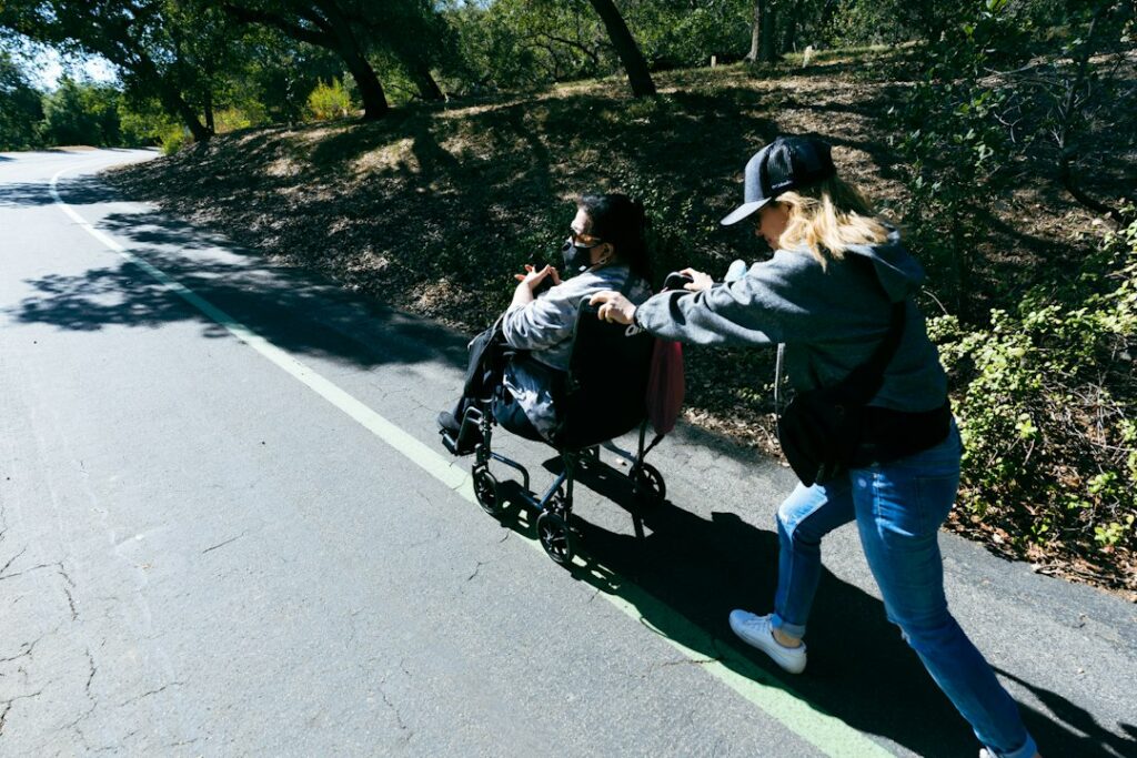 Illustrative photograph of a mother and daughter outdoors by Elmer Cañas, Unsplash. Not California EDD staff or program beneficiaries.