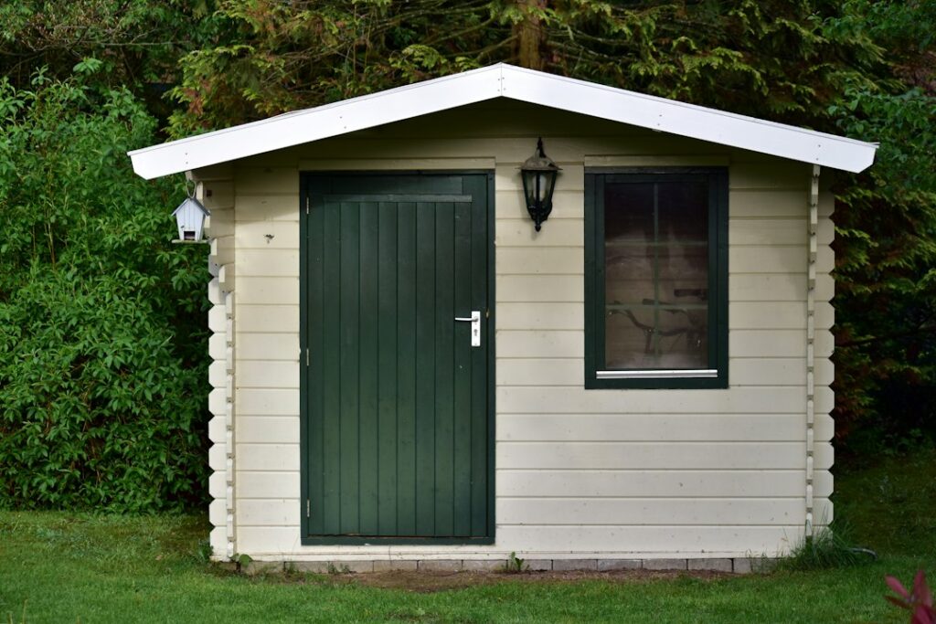 Small garden building, illustrative photo by Ries Bosch on Unsplash; not claimed to be an approved California accessory dwelling unit.