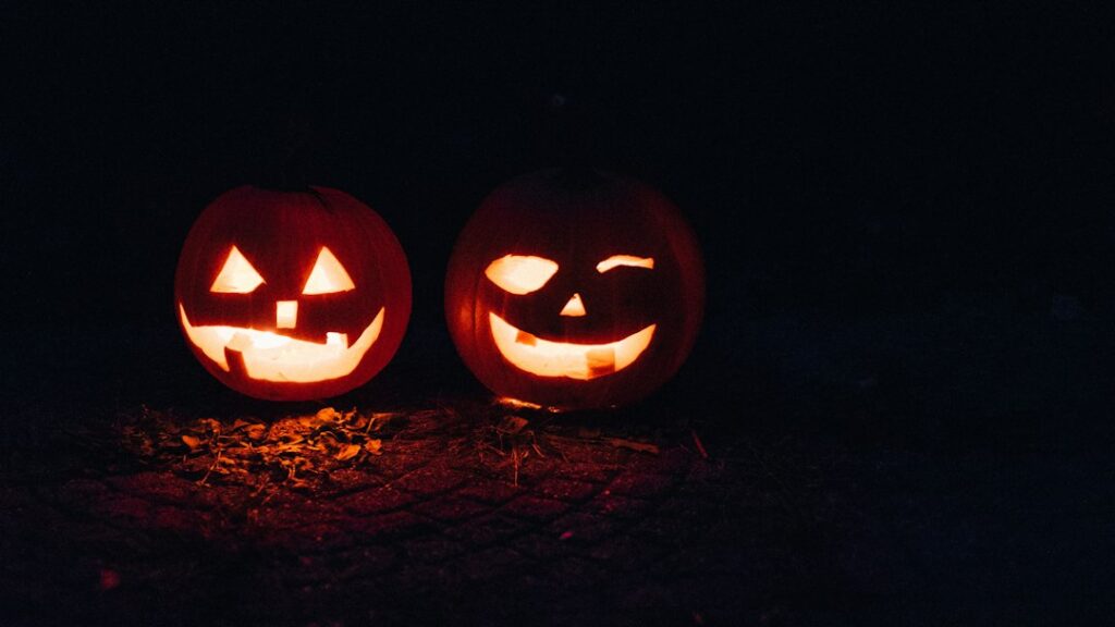 Illustrative Halloween jack-o-lantern, not a photo of the 2026 Dos Palos library event