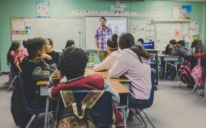 Illustrative classroom and teacher, not students at Prunedale Elementary School