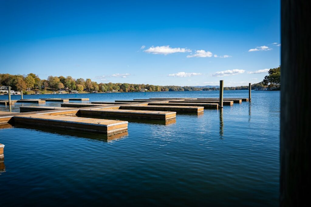 Illustrative floating boat docks on a lake, not a documented Nacimiento Reservoir dock or an enforcement case