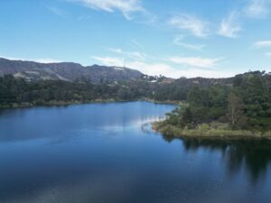 Illustrative mountain lake, not a real-time photograph of Trinity Lake water levels