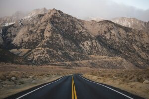 Illustrative mountain road, not the Route 299 project near Burnt Ranch