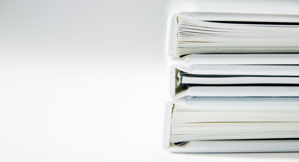 Stack of file folders representing public records; illustrative, not Nevada County meeting documents