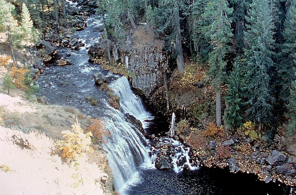Middle McCloud Falls on the McCloud River in Siskiyou County, California. Historical photo by Siskiyou County Visitors Bureau, 2001; public domain.
