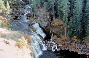 Middle McCloud Falls on the McCloud River in Siskiyou County, California. Historical photo by Siskiyou County Visitors Bureau, 2001; public domain.