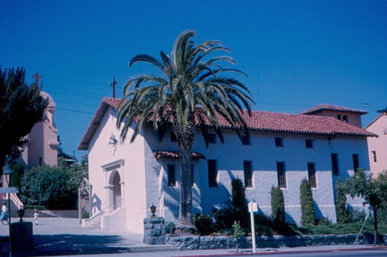 1963 archival photograph of the reconstructed Mission San Rafael Arcángel chapel in San Rafael, California, with palm tree.