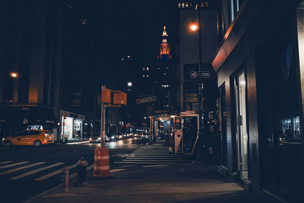 Illustrative nighttime street by Elric Pxl / Unsplash; does not show Lincoln Street in Watsonville or Caltrans crews.