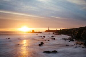 Pigeon Point Lighthouse at sunset near Pescadero, California; illustrative image not showing current restoration progress